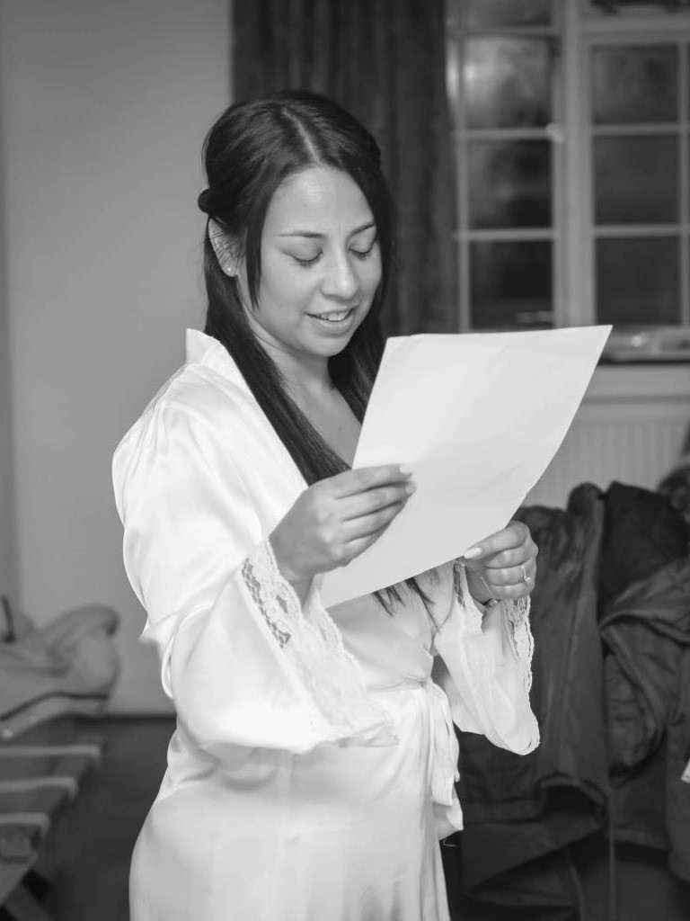 Bride to Be Reading Borrowed Advice From her Bridesmaids