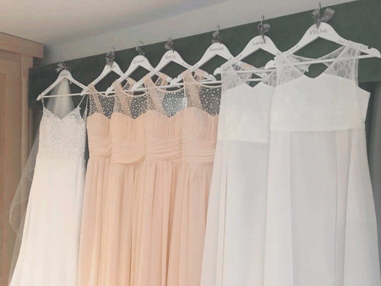 Bridal Party Wedding Outfits Hanging Up
