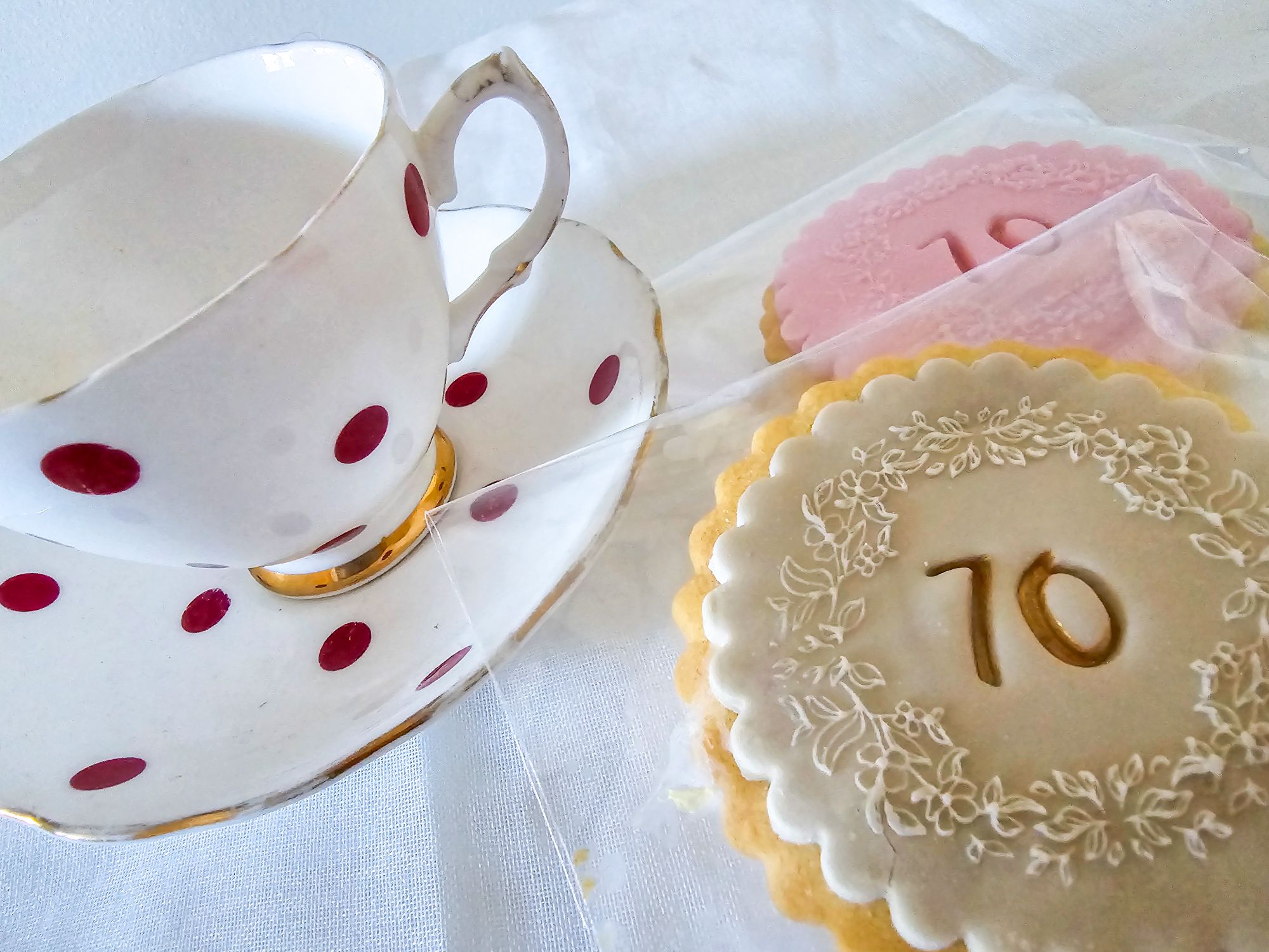 Vintage teacup with two personalised shortbread biscuits